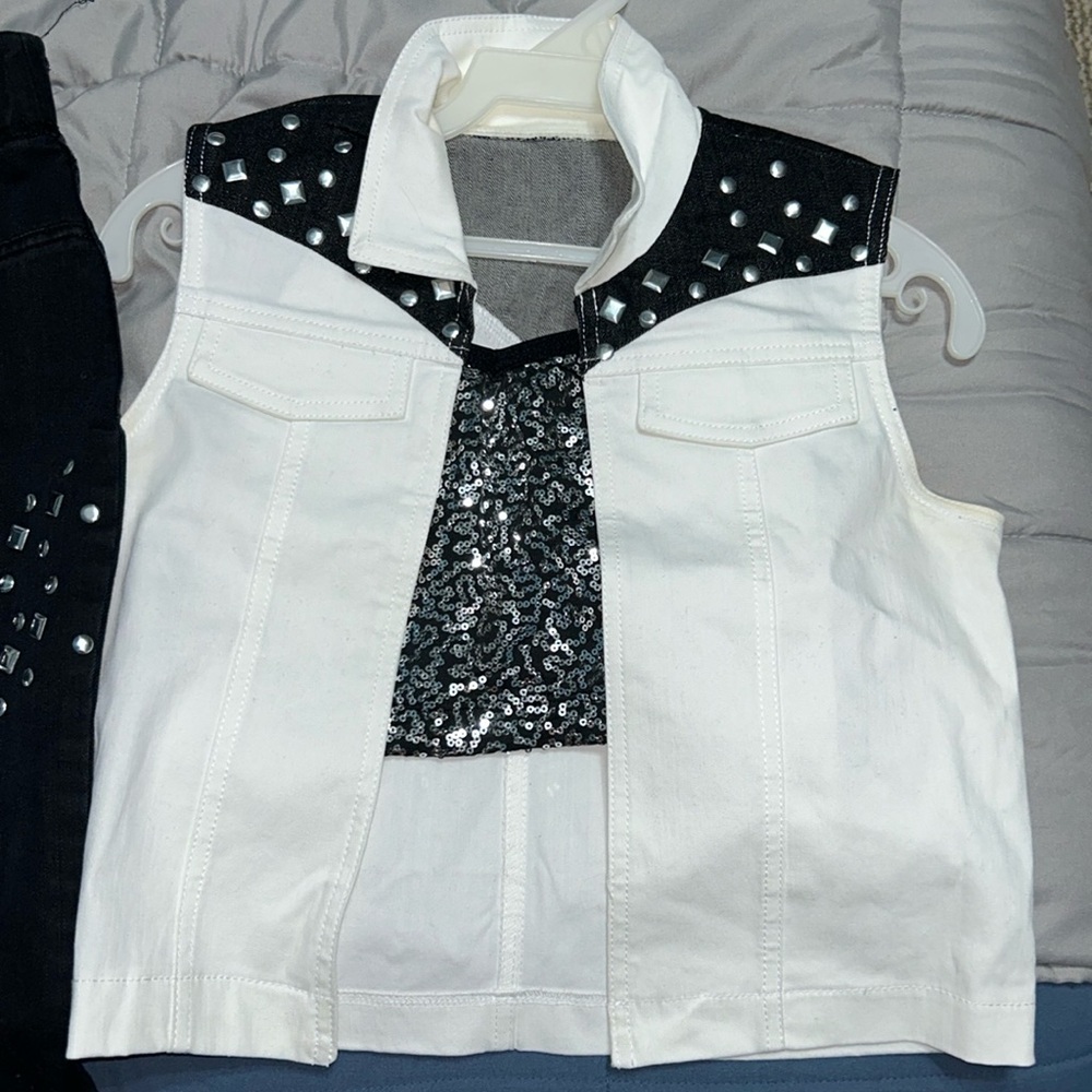 Vest, bra, jeans, and belt studded tap or dance costume